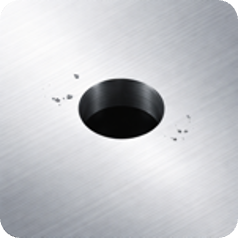 A quarter-inch hole — the customer lens